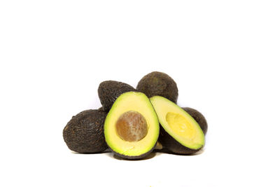 Close-up of fruits against white background