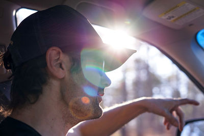 Young man in car