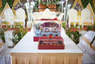 Close-up of wedding gift decorations on table