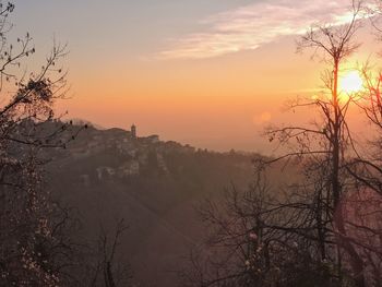 Scenic view of mountains against sky during sunrise