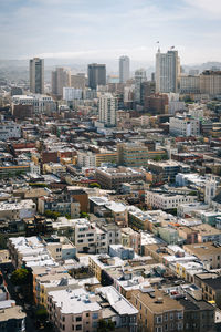 High angle view of buildings in city against sky