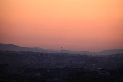 High angle view of townscape against sky at sunset