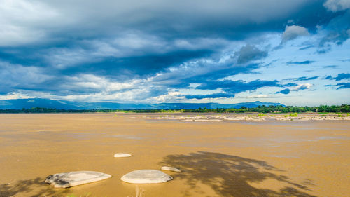 Scenic view of beach against sky