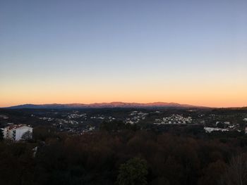 High angle view of townscape against sky at sunset