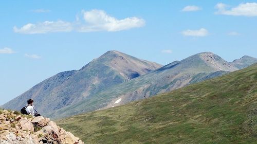 Man standing on rocky mountain