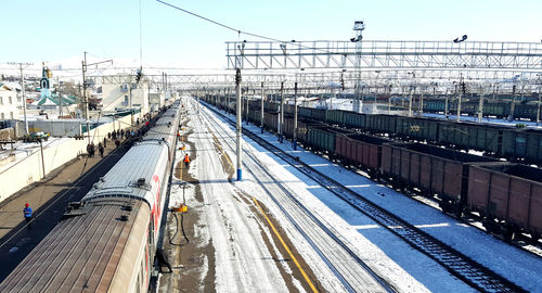 High angle view of train on railway station against sky