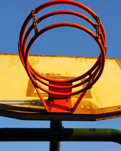 Close-up of spiral staircase against clear blue sky