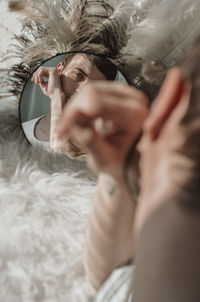 Portrait of young man in mirror