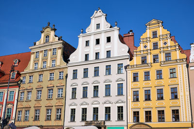 Colorful renovated houses at the market square in wroclaw, poland