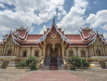 Facade of temple against building