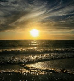 Scenic view of sea at sunset