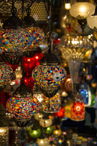 Close-up of illuminated lighting equipment for sale in market