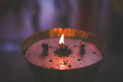 Close-up of burning candle