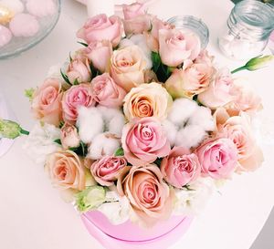 High angle view of roses in vase on table