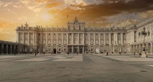 Building in city against cloudy sky