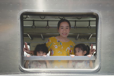 Portrait of siblings in bus