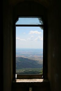 Scenic view of sea seen through window