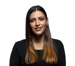 Portrait of a smiling young woman over white background