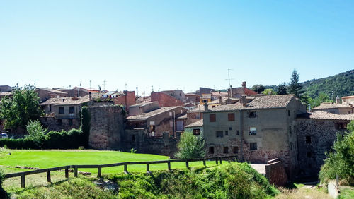 Residential buildings against clear sky