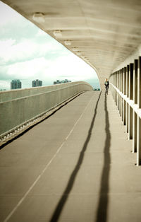 View of road against cloudy sky