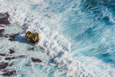 High angle view of waves in sea