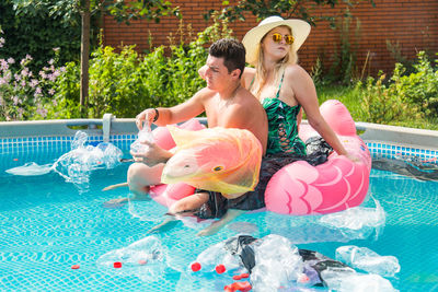 Woman swimming in pool