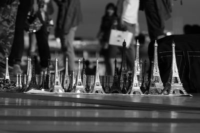 Close-up of people on glass table