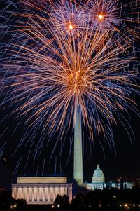 Firework display at night