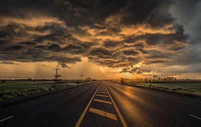 Road against sky during sunset