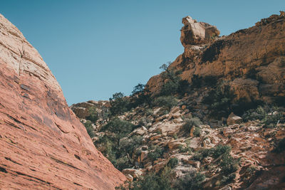 Low angle view of mountain against clear sky