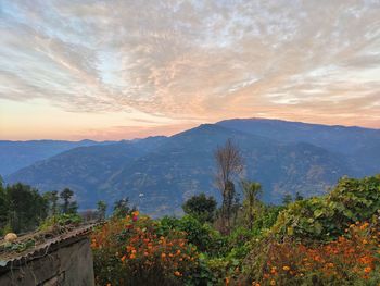 Scenic view of mountains against sky during sunset