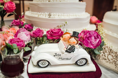 Close-up of wedding rings on table