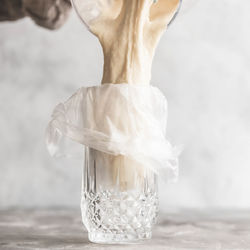 Close-up of drinking glass on table