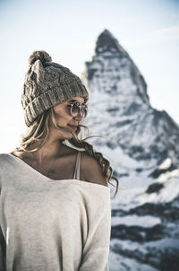 Rear view of young woman in winter