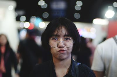 Portrait of young woman outdoors