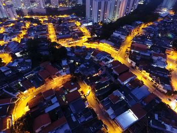 High angle view of illuminated buildings at night