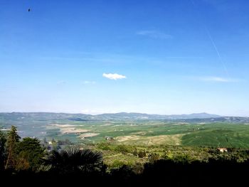 Scenic view of landscape against clear blue sky