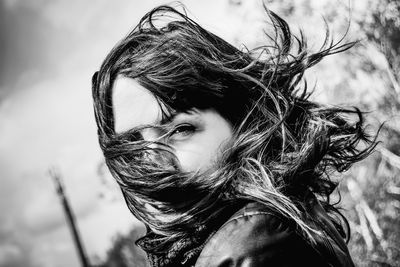 Portrait of woman with tousled hair