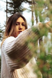 Portrait of young woman looking away