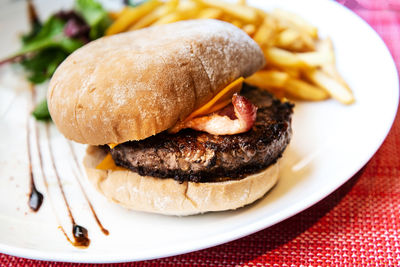 High angle view of hamburger in plate on table