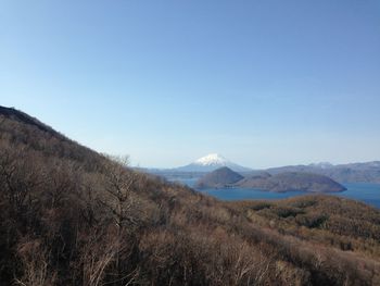 Scenic view of mountains against clear sky