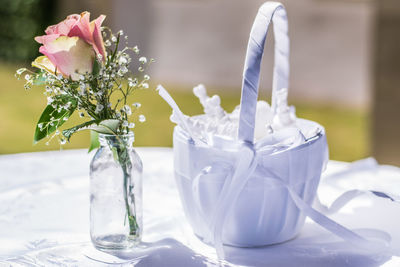 Close-up of white flower vase on table