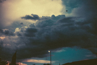 Low angle view of dramatic sky during sunset