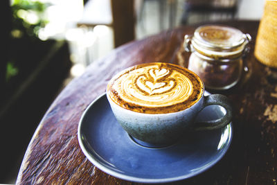 Close-up of cappuccino on table