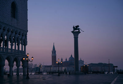 City lit up at sunset