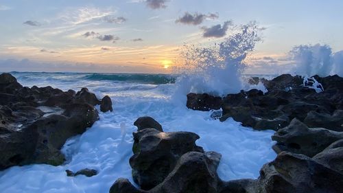 Scenic view of sea against sky during sunset