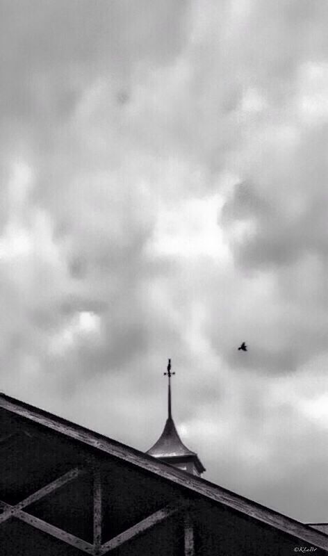 architecture, built structure, building exterior, low angle view, sky, cloud - sky, cloudy, high section, roof, place of worship, religion, cloud, church, spirituality, overcast, weather, outdoors, building