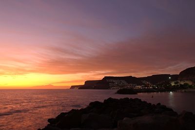 Scenic view of sea against sky during sunset