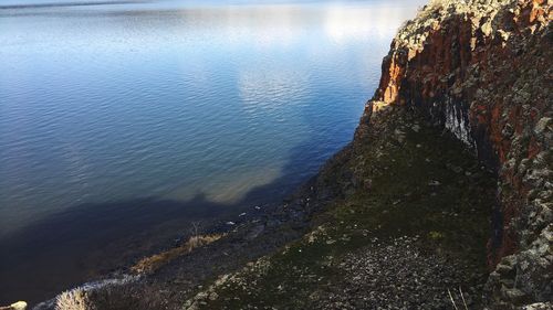 Reflection of trees in lake against sky