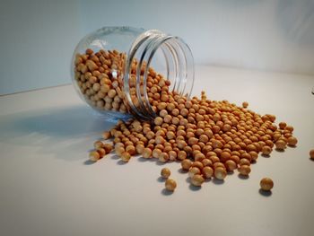 Close-up of eggs in jar on table